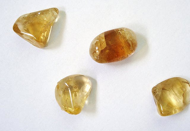 Citrine pebbles - gemstone scratch testing