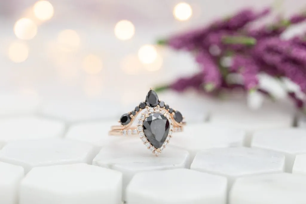 black diamond engagement ring in rose gold