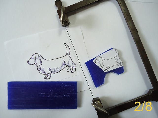 A drawing is used as a template to cut a design into wax. 