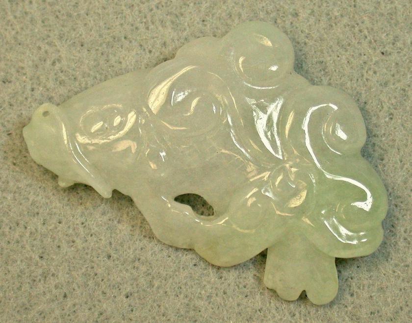 vintage jadeite koi fish pendant, back - grading gem carvings