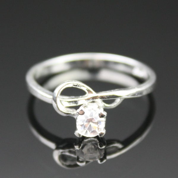 colorless zircon ring