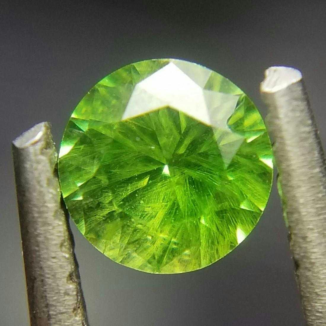 0.38-ct demantoid with horsetail inclusions - Russia
