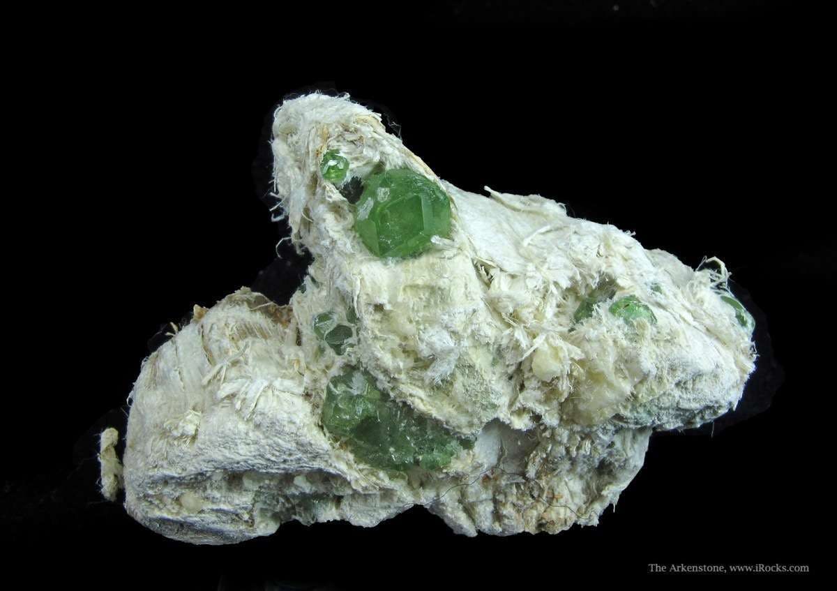 demantoid crystals in asbestos matrix - Italy