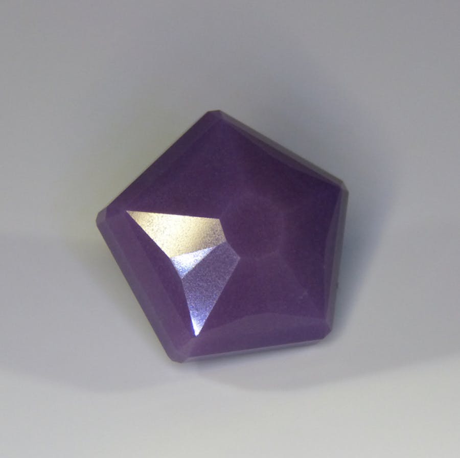 faceted sugilite by Mark Oros