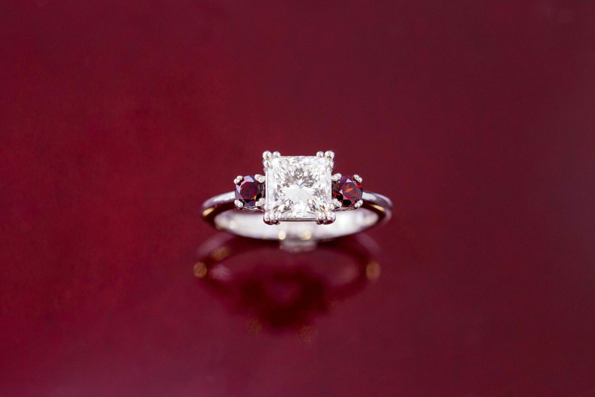 diamond and garnet platinum engagement ring - grading set gemstones