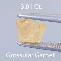 Rough version of Fancy Round Brilliant Cut Grossular Garnet