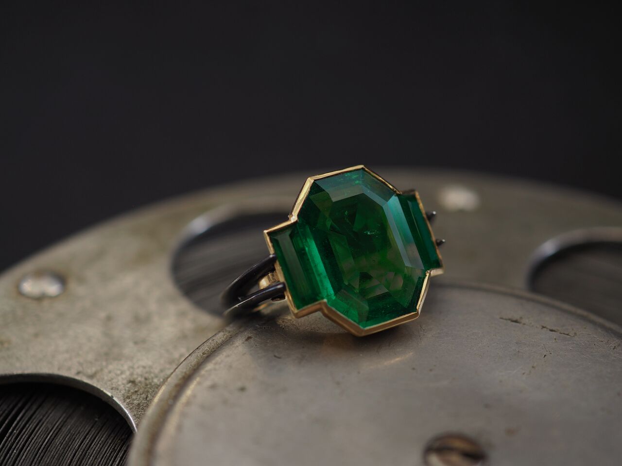 old mine emerald in a modern ring - emerald buying guide