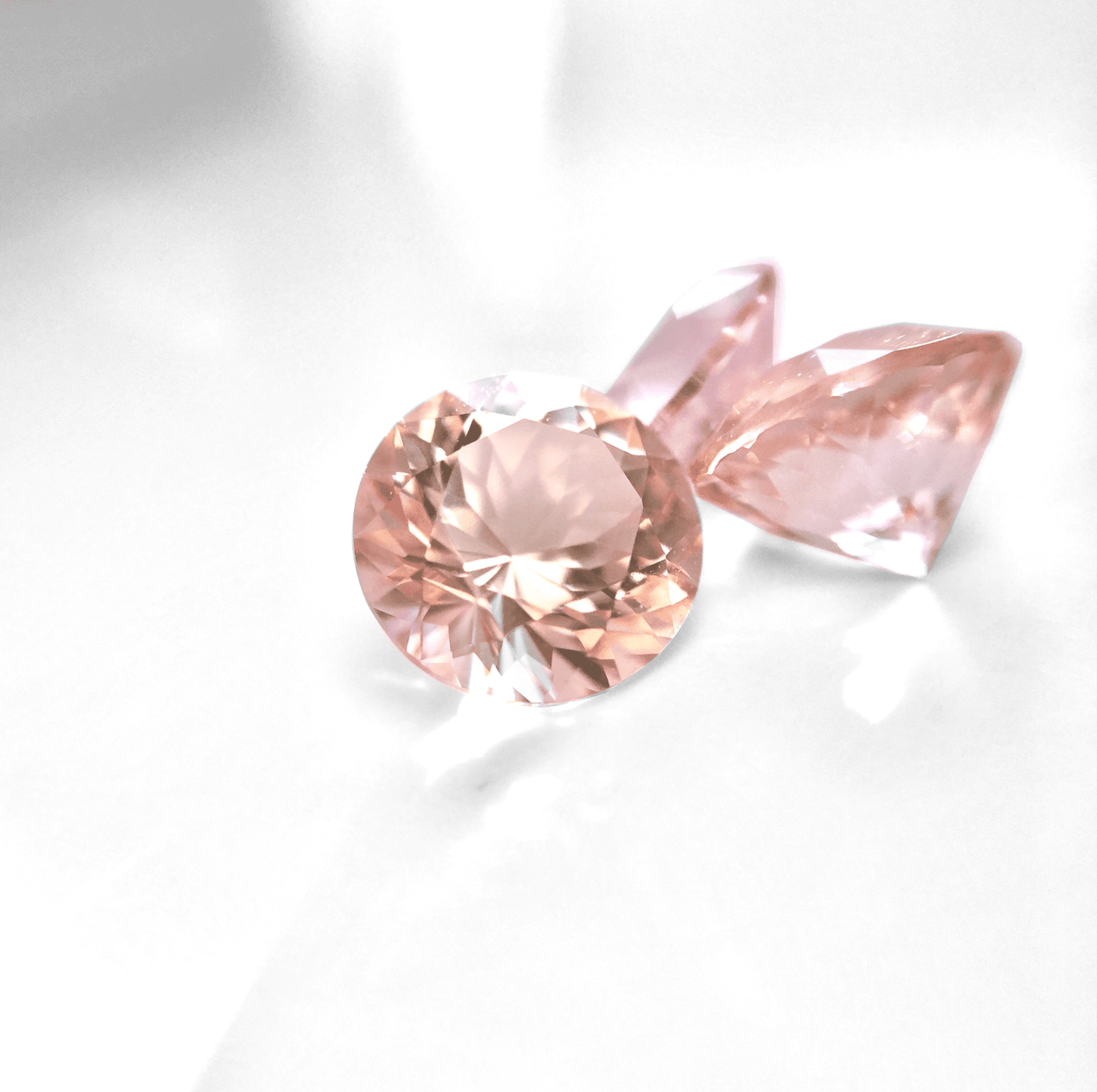 morganite buying guide - peach and pink cut stones