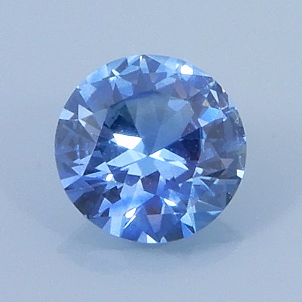 Finished version of Fancy Roudn Brilliant Cut Sapphire