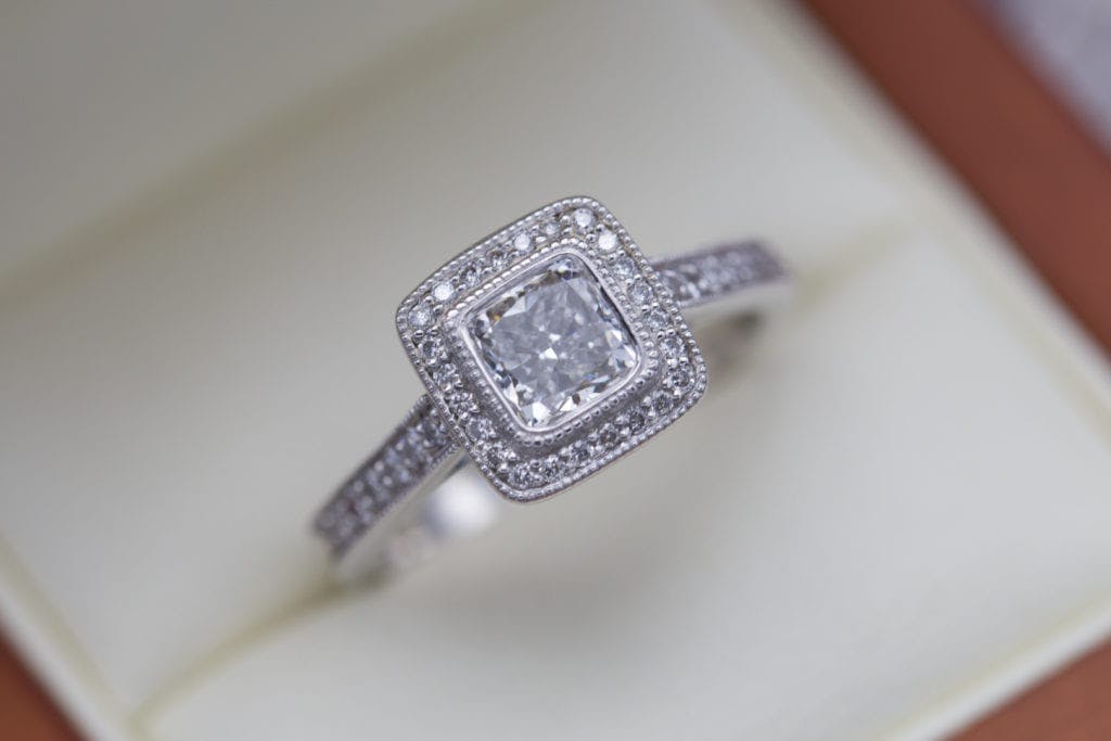 diamond shape - cushion cut diamond halo engagement ring