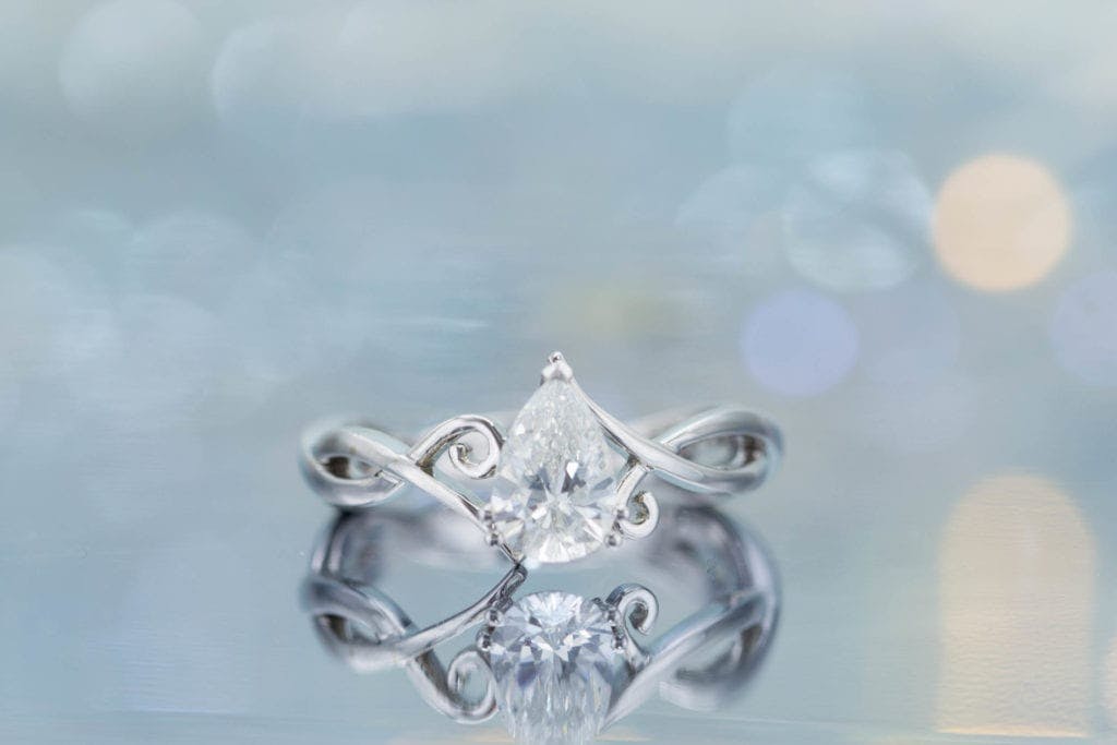 diamond shape - pear cut diamond engagement ring with vining