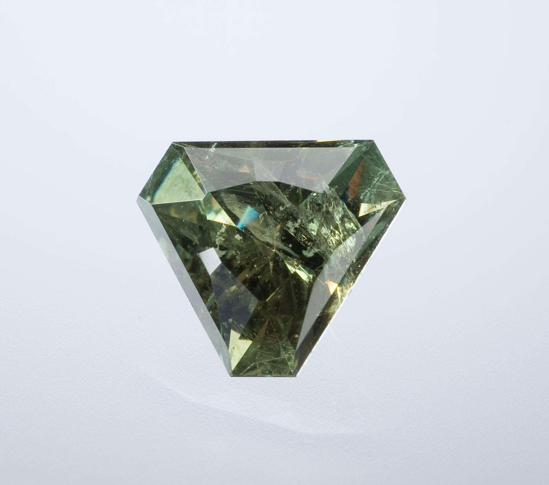 trilliant-cut demantoid garnet - expensive engagement ring stones