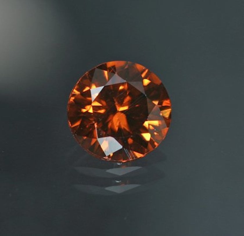 tenebrescent orange zircon