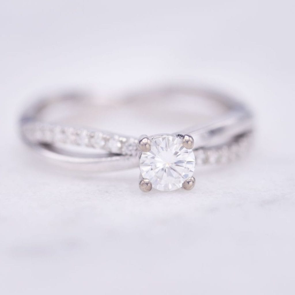 moissanite vs diamond - moissanite engagement ring twisting pave band