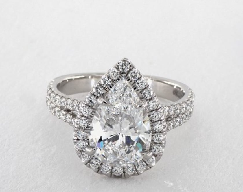 pear-cut halo engagement ring - three-carat diamond guide