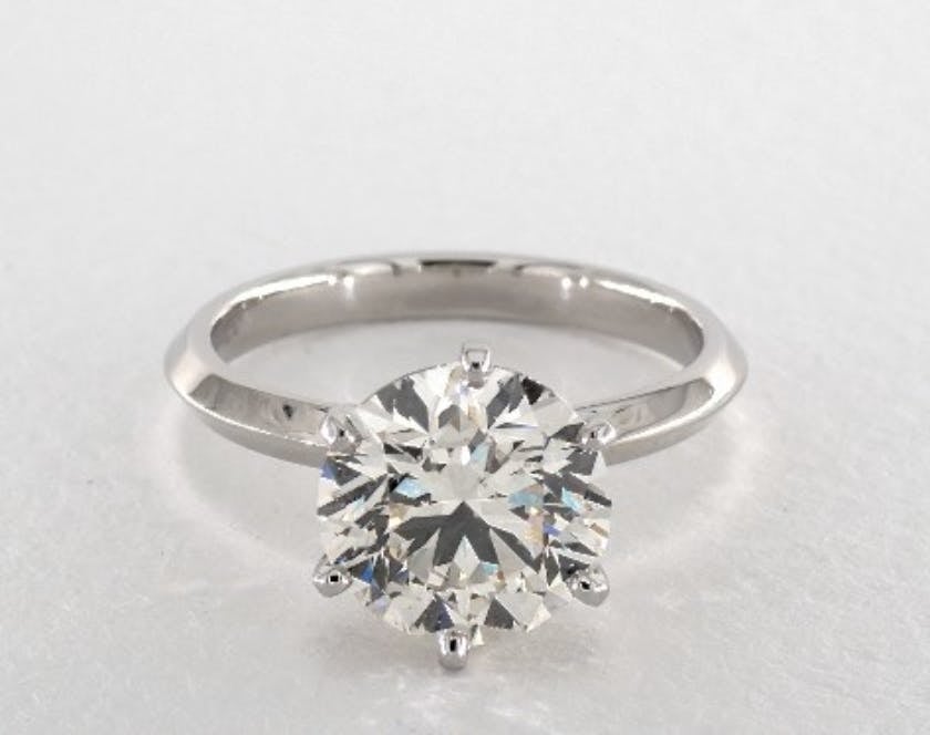 round solitaire engagement ring - three-carat diamond guide