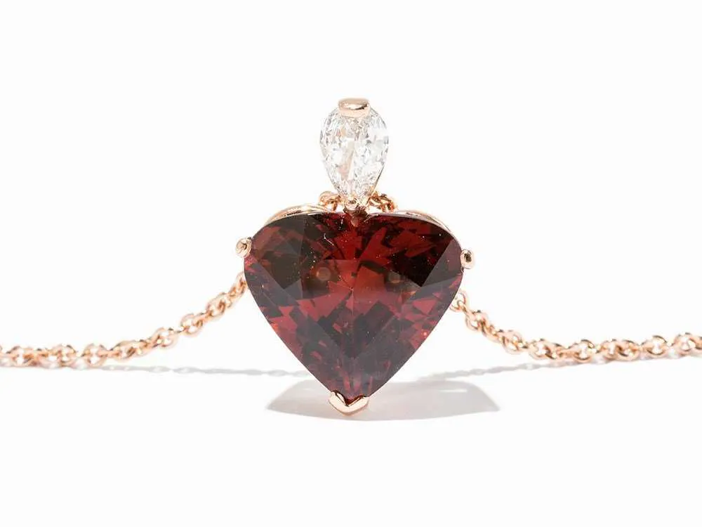 heart-cut spessartine garnet and diamond pendant - garnet symbolism and legends