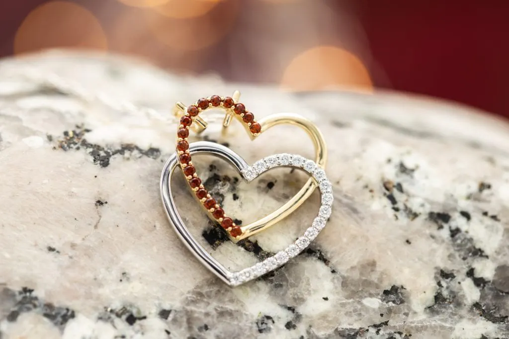 garnet and diamond hearts - garnet symbolism and legends