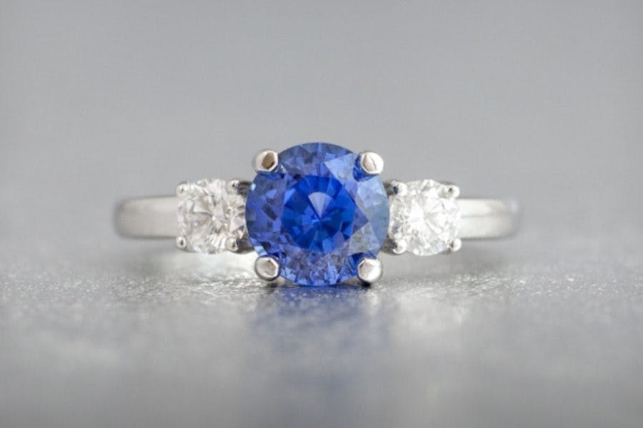three-stone ring with sapphire and diamonds - engagement ring setting