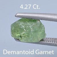 Rough version of Barion Emerald Cut Demantoid Garnet