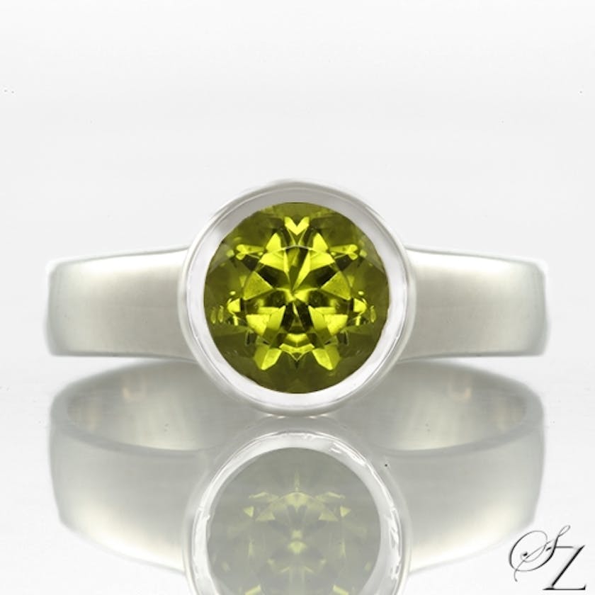 sterling sliver ring with bezel-set peridot