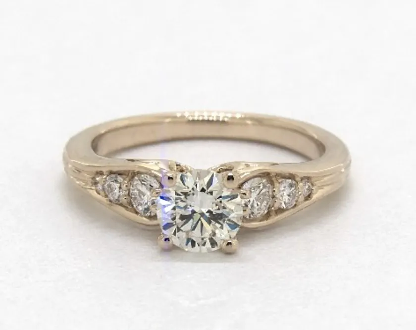 L color side stone engagement ring