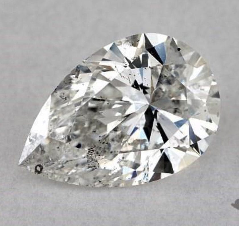 1.03-ct, pear cut, I1, with dark inclusion reflections