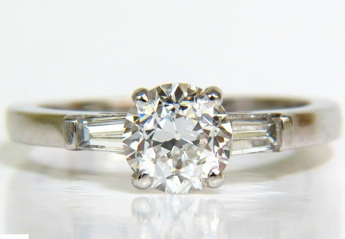 F color OEC diamond in white gold ring