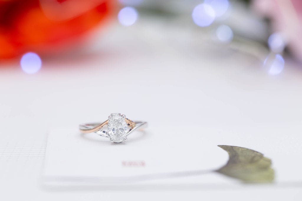 custom-made rose and white gold engagement ring