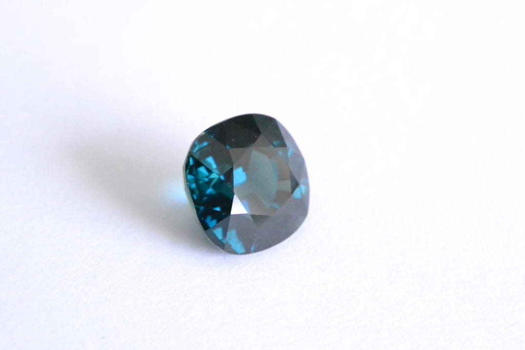 cushion-cut teal sapphire