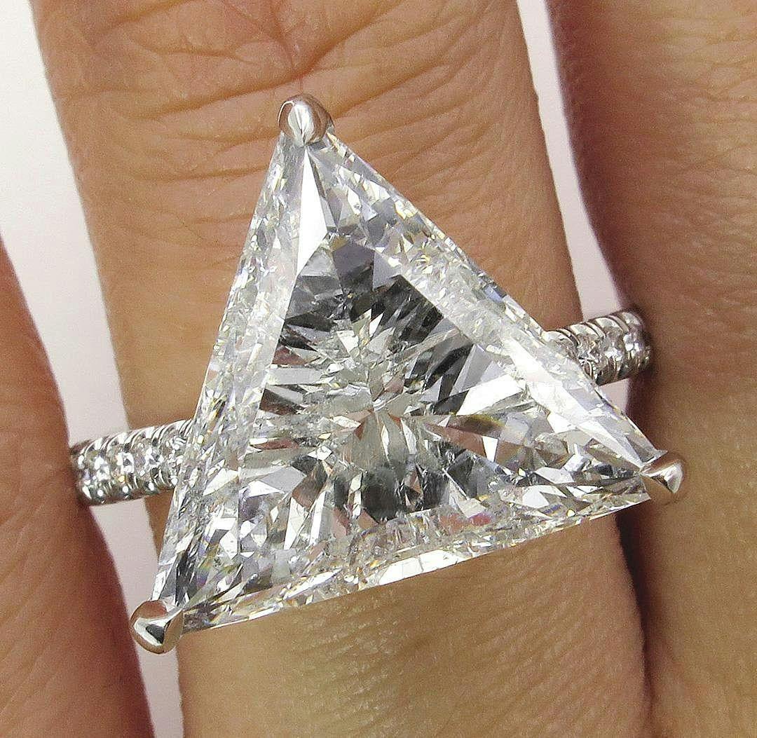 platinum engagement ring with trillion-cut diamond