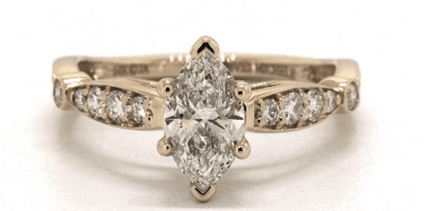 K color diamond in a vintage-style setting