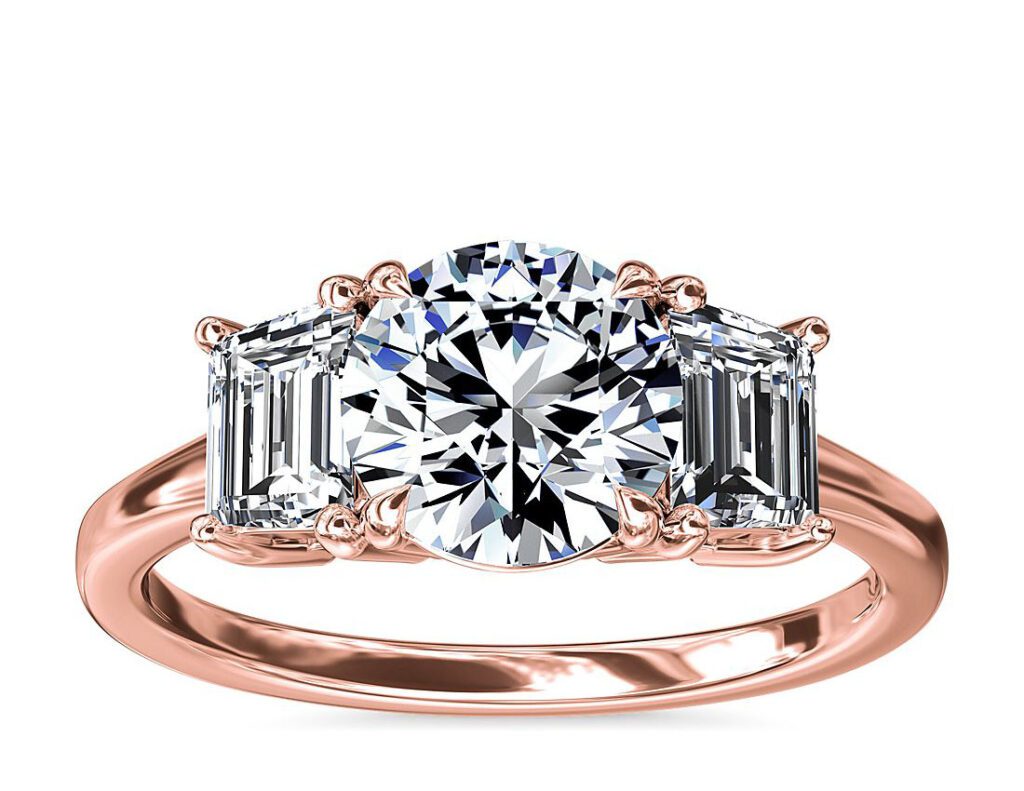 Three-Stone Emerald Cut Diamond Engagement Ring in 18k Rose Gold Blue NIle