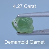 Rough version of Custom Emerald Cut Demantoid Garnet