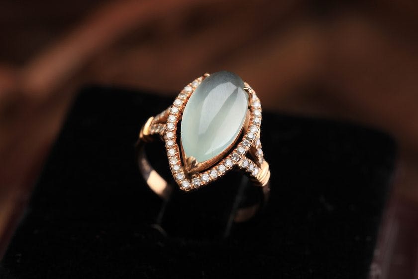 jade engagement ring with protective setting