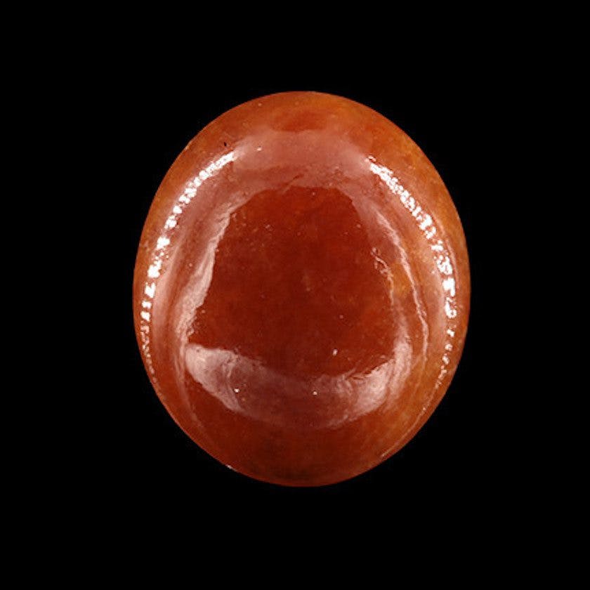 brownish red nephrite cabochon
