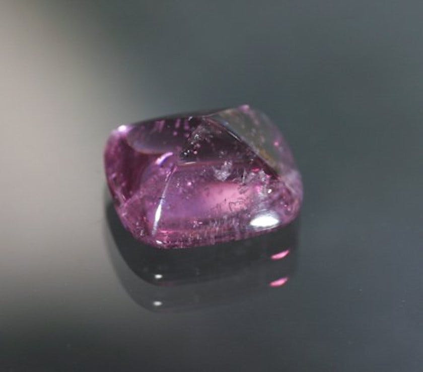 sugarloaf cabochon spinel with eye-visible inclusions