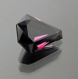 Fancy Elongated Shield Shape Cut Color Change Garnet (mild color change)