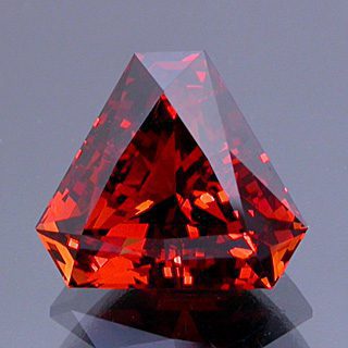 Mixed Scissor/Step Triangle Cut Spessartite Garnet