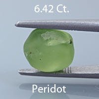 Rough version of Scissors Emerald Cut Peridot