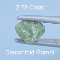 Rough version of Custom Cushion Hexagon Cut Demantoid Garnet