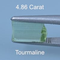Rough version of Custom Brilliant Emerald Cut Tournaline