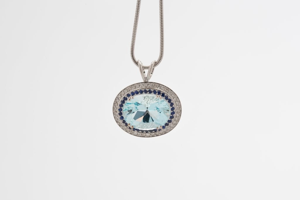 recut aquamarine pendant - repaired and recut gems