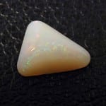 elongated triangular cabachon Cut Opal