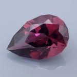 Finished version of Brilliant Pear Cut Tanga Rhodolite Garnet