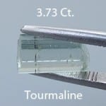 Rough version of Fancy Brilliant Emerald Cut Oyo Tourmaline