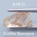 Rough version of Fancy Buff Top Oval Cut Sunstone