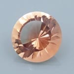 Finished version of Fancy Curved Facet Round Cut Sunstone