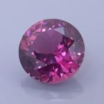 Finished version of Fancy Portuguese Brilliant Cut Rhodolite Garnet