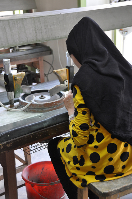 "Untitled," an artisan polishes gems during the reopening of the refurbished Turquoise Mountain Foundation in the heart of Kabul's Old City, Afghanistan, on Monday, May 09, 2011(Mireille Zieseniss/Department of State), by US Embassy Kabul Afghanistan is licensed under CC By-ND 2.0